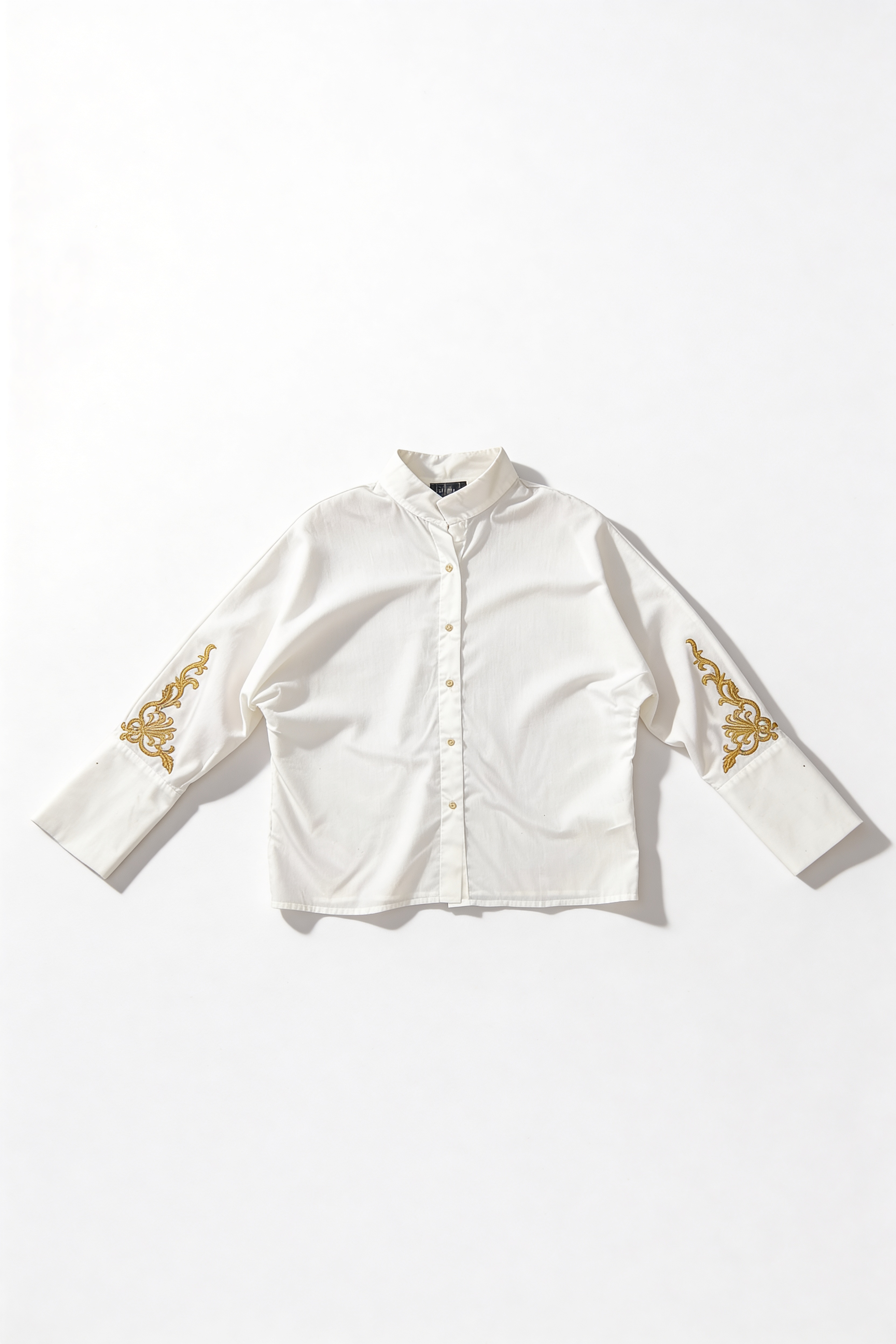 White gold appliqué blouse