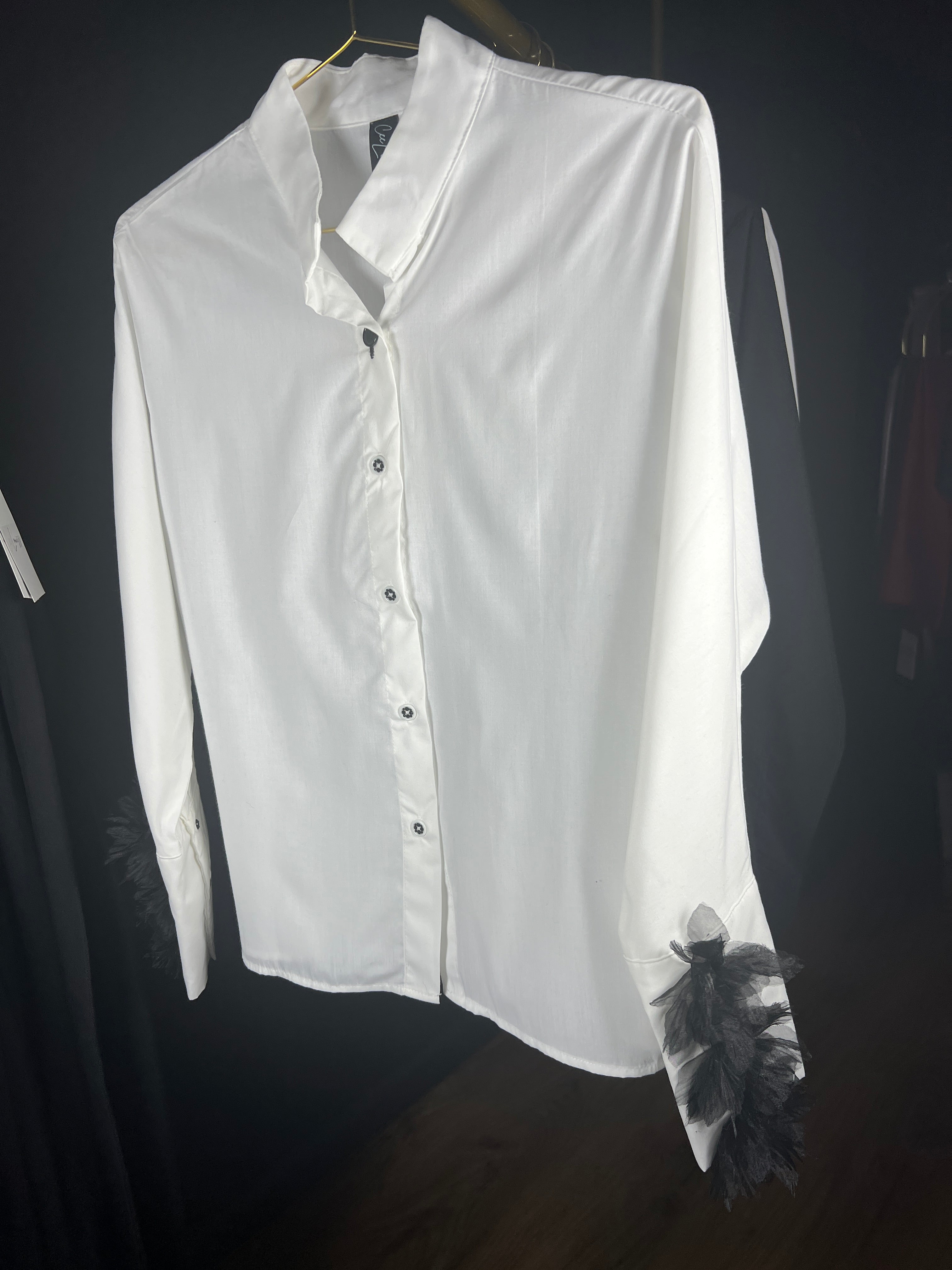 White feather shirt